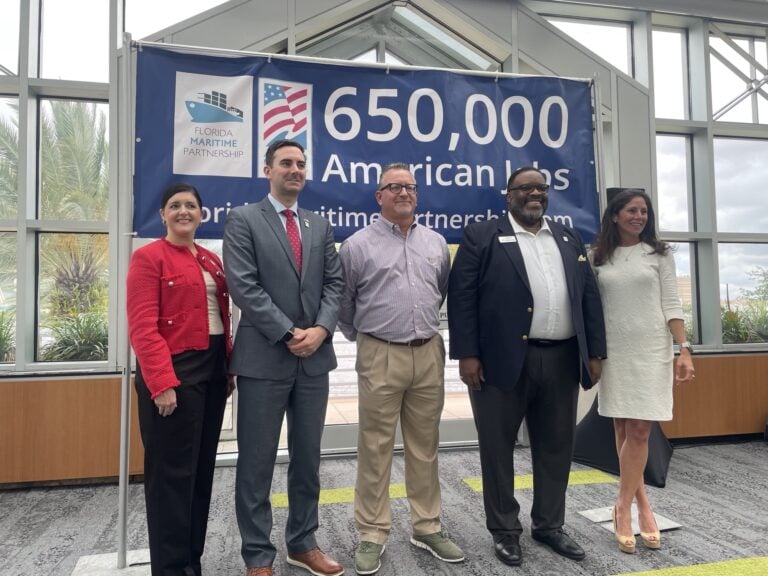 650,000 American jobs in the Florida maritime industry banner with five people standing in front.